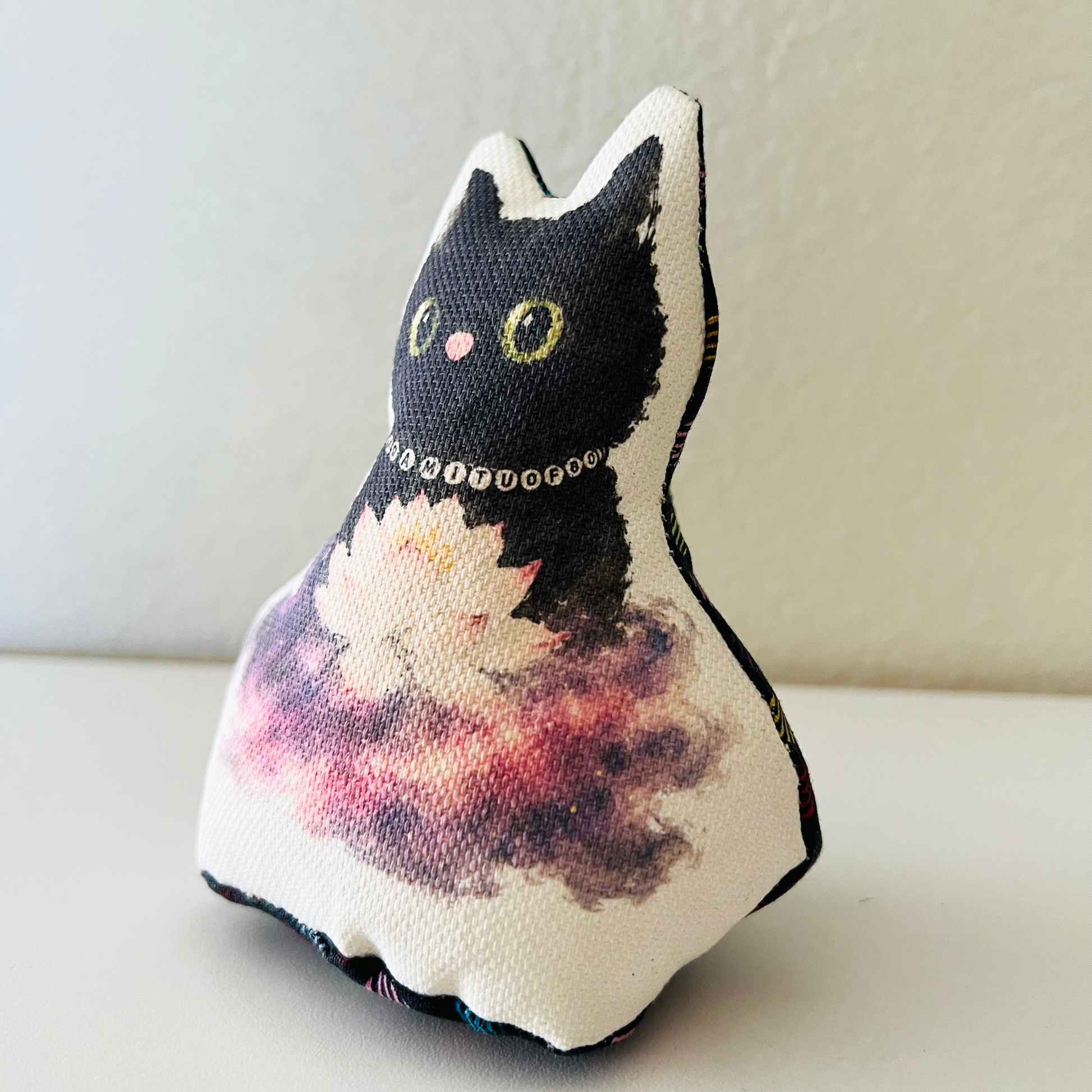 Luna Paws weighted black cat Otedama shown at a three-quarter angle